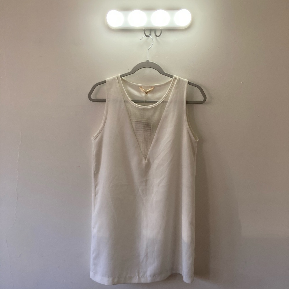 Shills V White dress